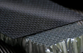 Black carbon fiber composite product material background